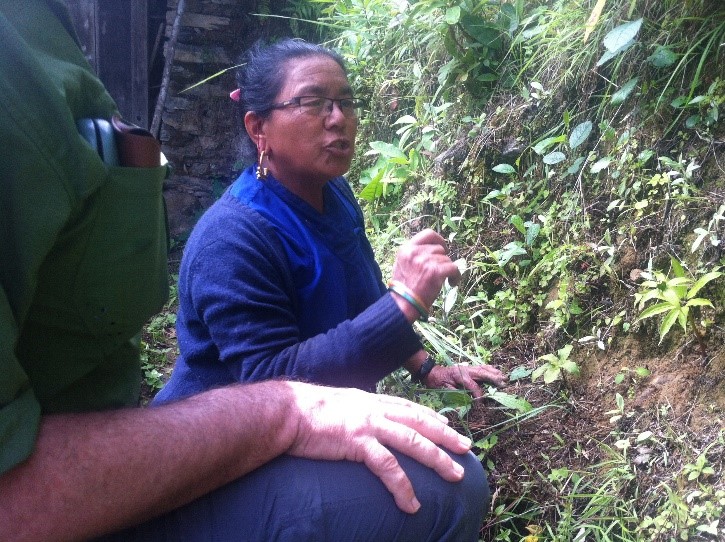   A woman in a high-hill village explaining the diversity of medicinal plants