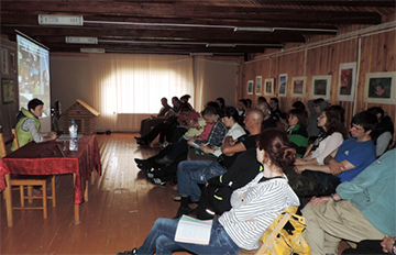 enozero NP staff presenting about their experience in environmental education, ecotourism, and cooperation with local communities