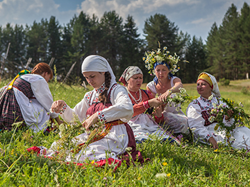 Women braiding wreaths
