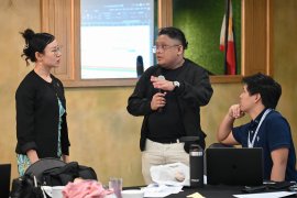 Representatives from IGES, CENRO, and CAI