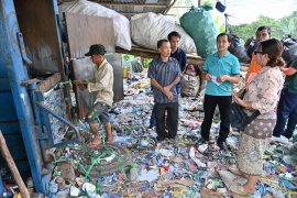 Xay participants visiting Luang Prabang's recycling factory